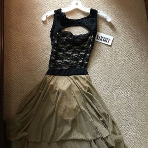 Black lace costume with gold bottom